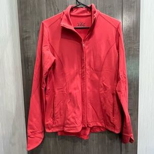 Cute Reebok lightweight soft jacket with fun back detail.